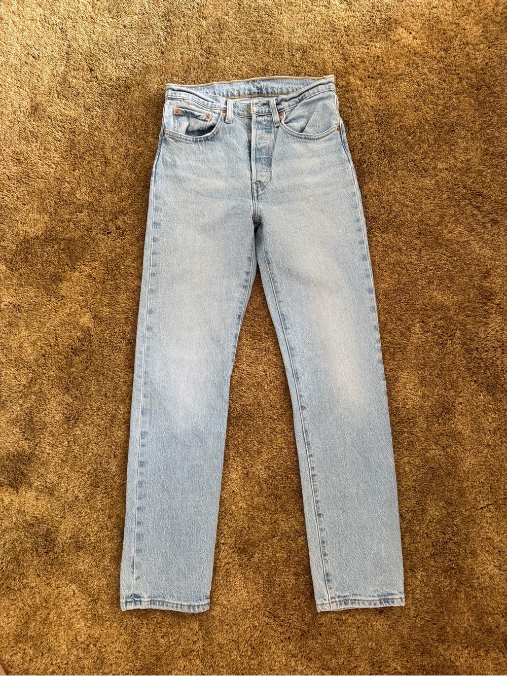 Light wash Levi's 501 straight leg jeans; perfect condition